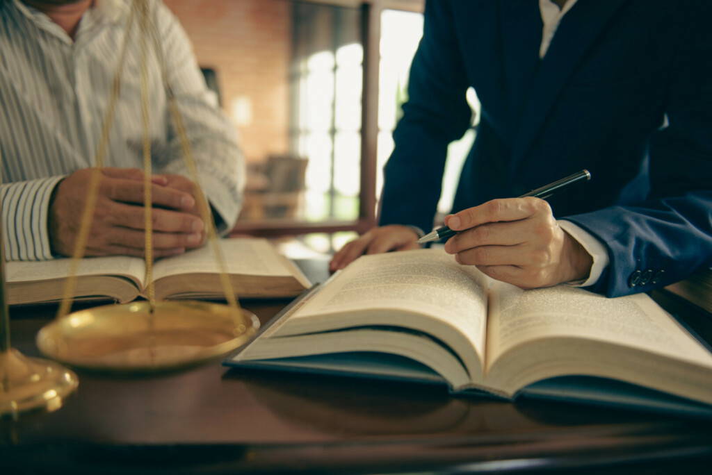 photo : Business and lawyers discussing contract papers and juristic in office law legal services advice justice.